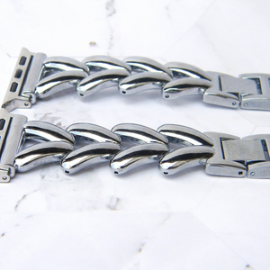 Silver metal bracelet on a white background